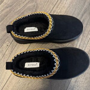BAMBOO Black Slip-Ons with Gold and White Accents